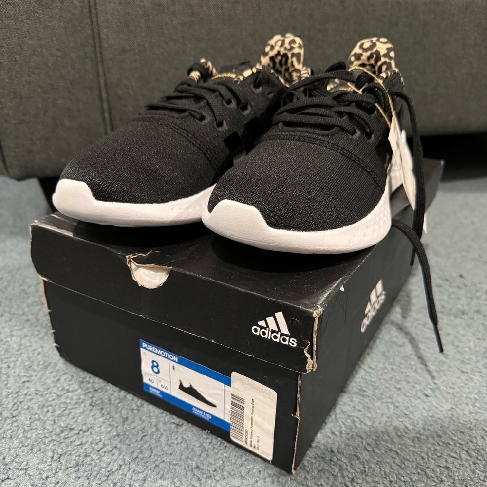 adidas Black Athletic Shoes with White Sole and Leopard Accent